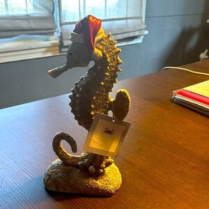 Ceramic seahorse with a Santa hat 11 inches